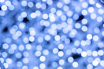 Image showing Wonderful holiday illumination of sparkling white and blue bokeh background