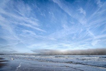 Image showing Dark clouds coming in over the sea