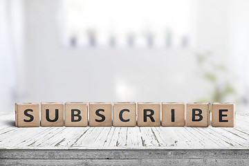 Image showing Subscribe word on a wooden sign