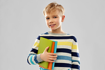 Image showing little student boy with books