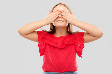 Image showing girl with eyes closed by hands