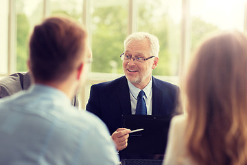 Image showing business people with laptop meeting in office