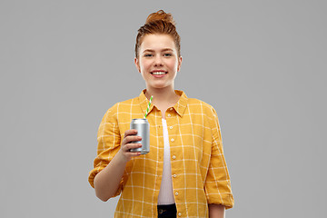 Image showing young woman or teenage girl drinking soda from can