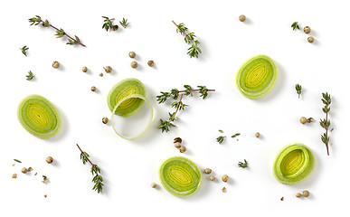 Image showing leak slices and spices on white background