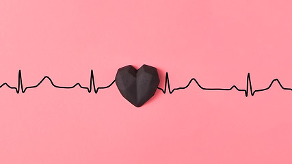 Image showing Echocardiogram of love, cardiac markers with plastic black heart.