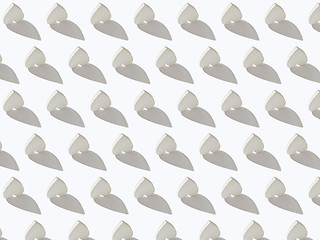 Image showing Pattern from gypsum inverted hearts with hard shadows.