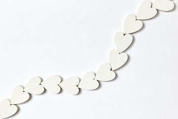 Image showing Hearts decoration in the shape of chain with soft shadows.