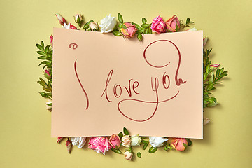 Image showing Written text card I love you in the flowers frame.