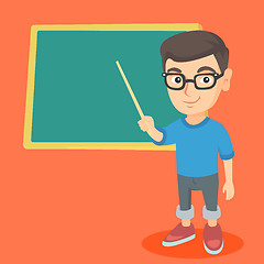 Image showing Caucasian student pointing at the blackboard.