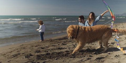 Image showing Young family enjoying vecation during autumn