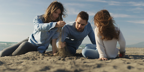 Image showing Young family enjoying vecation during autumn