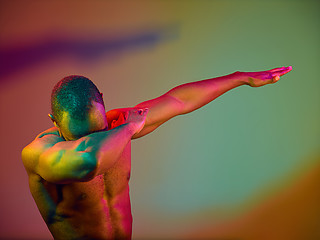 Image showing Close up portrait of a young naked african man looking at camera indoors