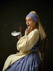 Image showing Medieval Woman in Historical Costume Wearing Corset Dress and Bonnet.