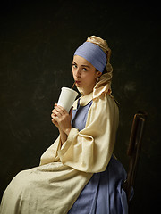 Image showing Medieval Woman in Historical Costume Wearing Corset Dress and Bonnet.