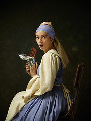 Image showing Medieval Woman in Historical Costume Wearing Corset Dress and Bonnet.