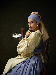 Image showing Medieval Woman in Historical Costume Wearing Corset Dress and Bonnet.