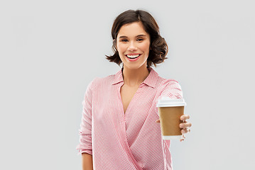 Image showing woman drinking takeaway coffee in paper cup