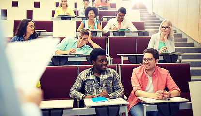 Image showing group of students with notebooks at lecture hall