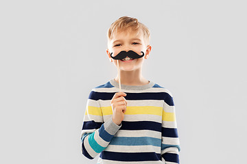 Image showing smiling boy with black vintage moustaches