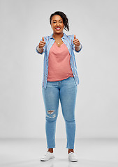 Image showing happy african american woman showing thumbs up