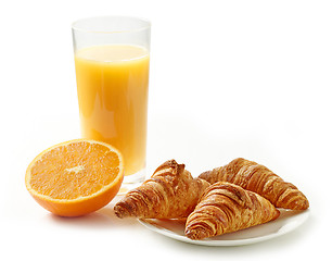 Image showing freshly baked croissants and orange juice