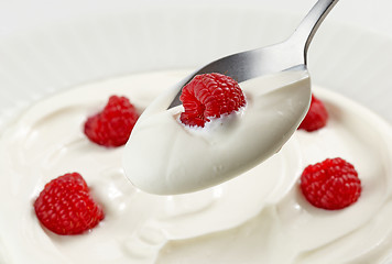 Image showing spoon of greek yogurt with raspberry