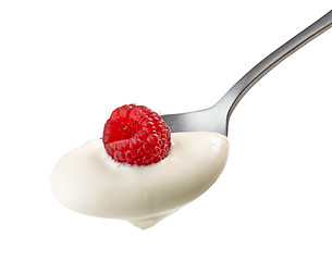 Image showing spoon of yogurt cream with raspberry