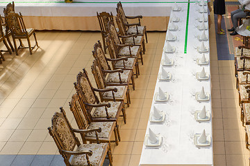 Image showing Aerial view to the long served table