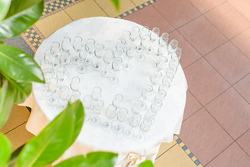 Image showing Aerial view to the table with champagne glasses