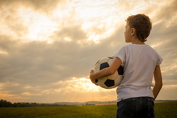 Image showing Portrait of a young  boy with soccer ball.