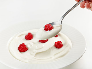 Image showing spoon of greek yogurt with raspberry