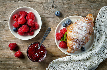 Image showing sweet croissant and berries