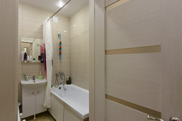 Image showing The entrance to a small combined bathroom in the apartment