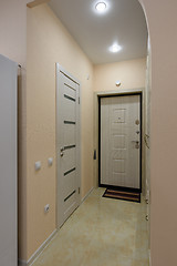 Image showing The hallway in the apartment, the front door and the door to the bathroom