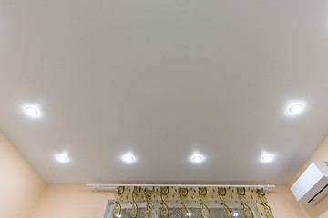Image showing Light bulbs located on the perimeter of the stretch ceiling
