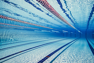 Image showing Olympic Swimming pool under water background.