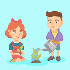 Image showing Caucasian boy and girl planting a sprout.