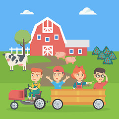 Image showing Boy driving a tractor with his friends in trailer.