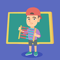 Image showing Boy with abacus on the background of blackboard.