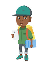 Image showing African schoolboy holding cellphone and textbook