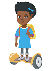 Image showing African schoolgirl riding on gyroboard to school.