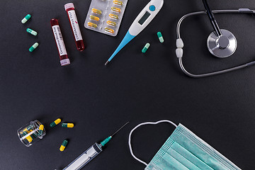 Image showing Blood test tube with the Coronavirus disease for virus test and 