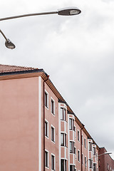 Image showing Pink building and streetlight