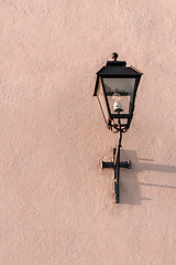 Image showing Streetlight on a textured pink wall