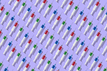 Image showing Health-care pattern from colorful vaccine\'s plastic syrenges.