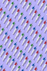 Image showing Medical pattern from plastic multicolored disposable syrenges.