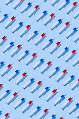 Image showing Medical pattern from disposable vaccine\'s syringes with shadows.