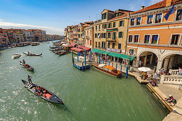 Image showing Venice, Italy. Small passenger ship carries tourists across the city