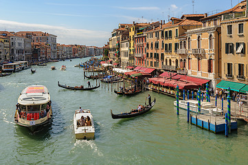 Image showing Venice, Italy. Small passenger ship carries tourists across the city