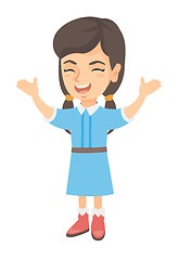 Image showing Happy caucasian girl standing with raised hands.